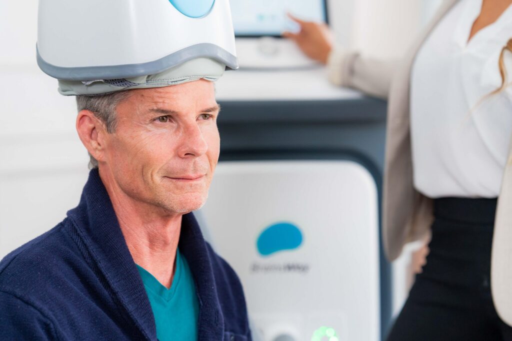 Man getting TMS treatment