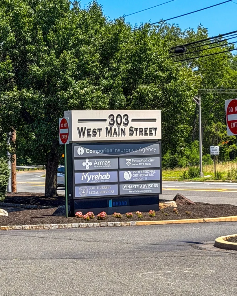 The 303 West Main Street sign outside our Freehold office